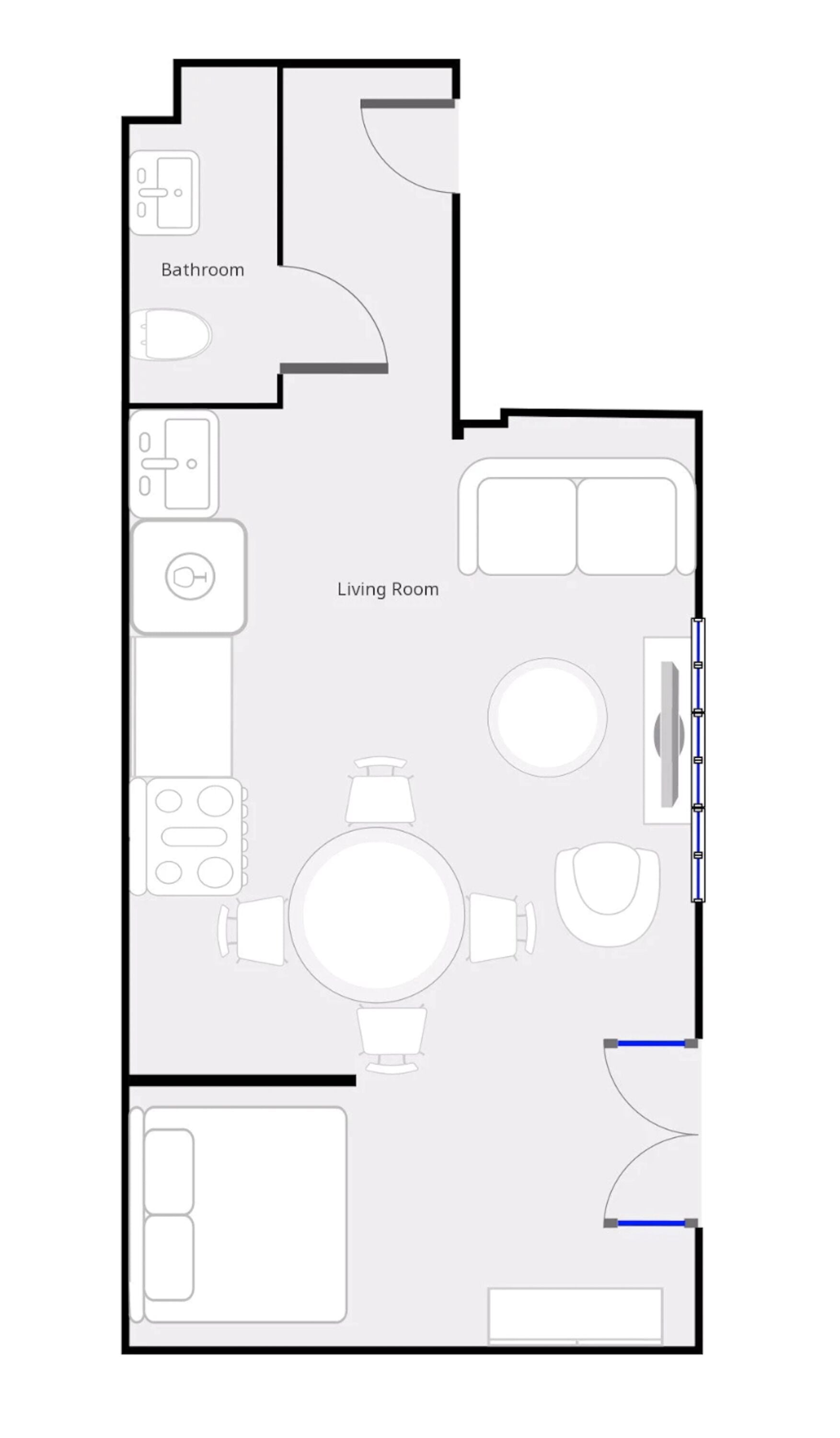 A floor plan of a hotel room with a living room, a bathroom, and a kitchenette.