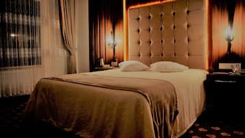 Habitación Deluxe | 2 dormitorios, cortinas opacas, wifi gratis y ropa de cama