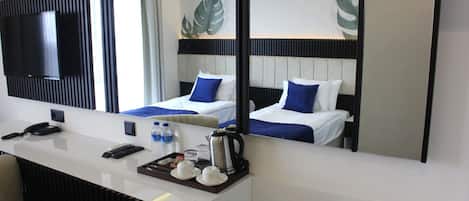 1 kamar tidur, seprai antialergi, minibar, dan brankas