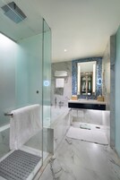 Separate tub and shower, free toiletries, hair dryer, bathrobes