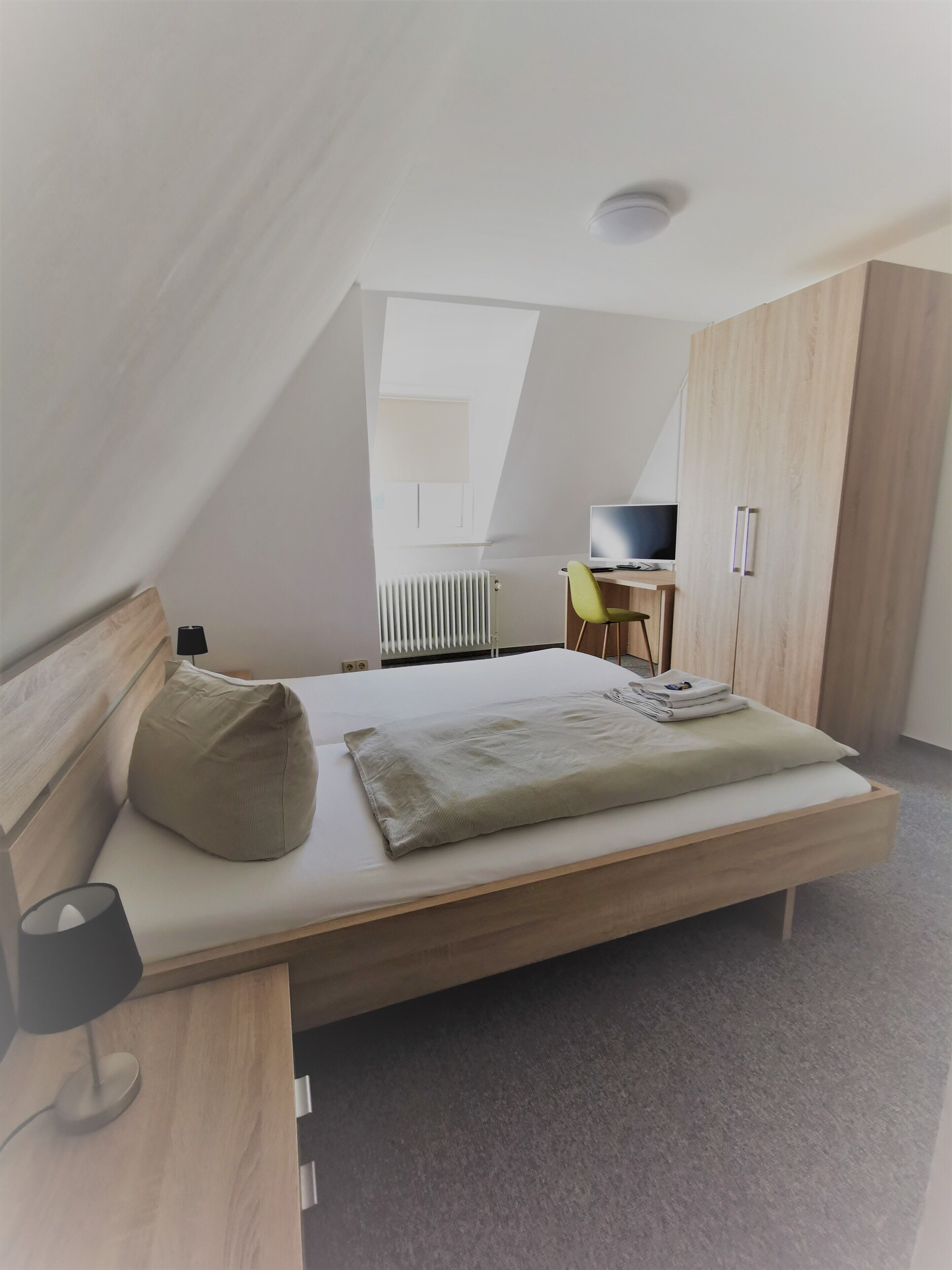 hypo-allergenic bedding, desk, blackout curtains, iron/ironing board