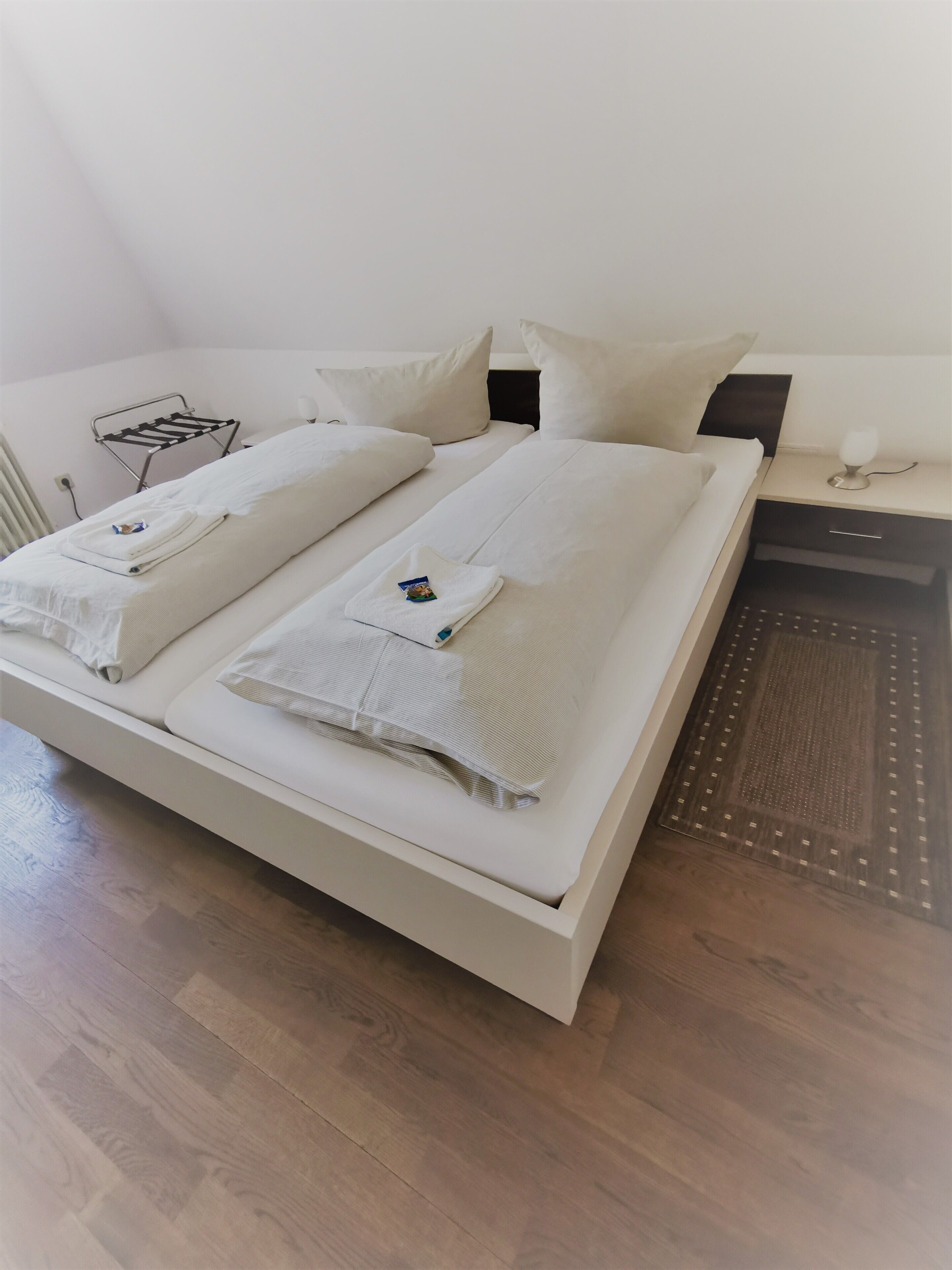 hypo-allergenic bedding, desk, blackout curtains, iron/ironing board