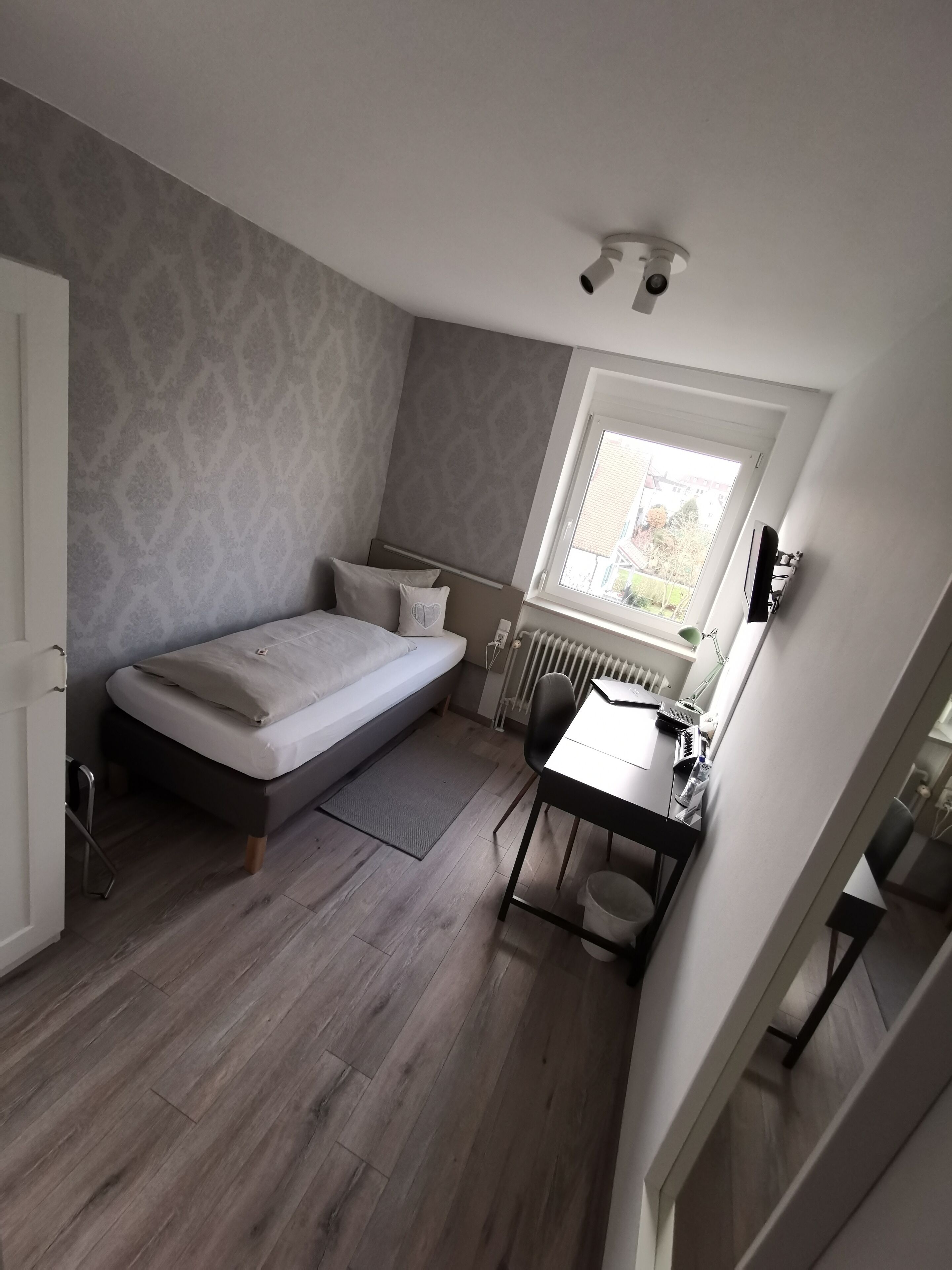 economy single room | hypo-allergenic bedding, desk, blackout curtains, iron/ironing board