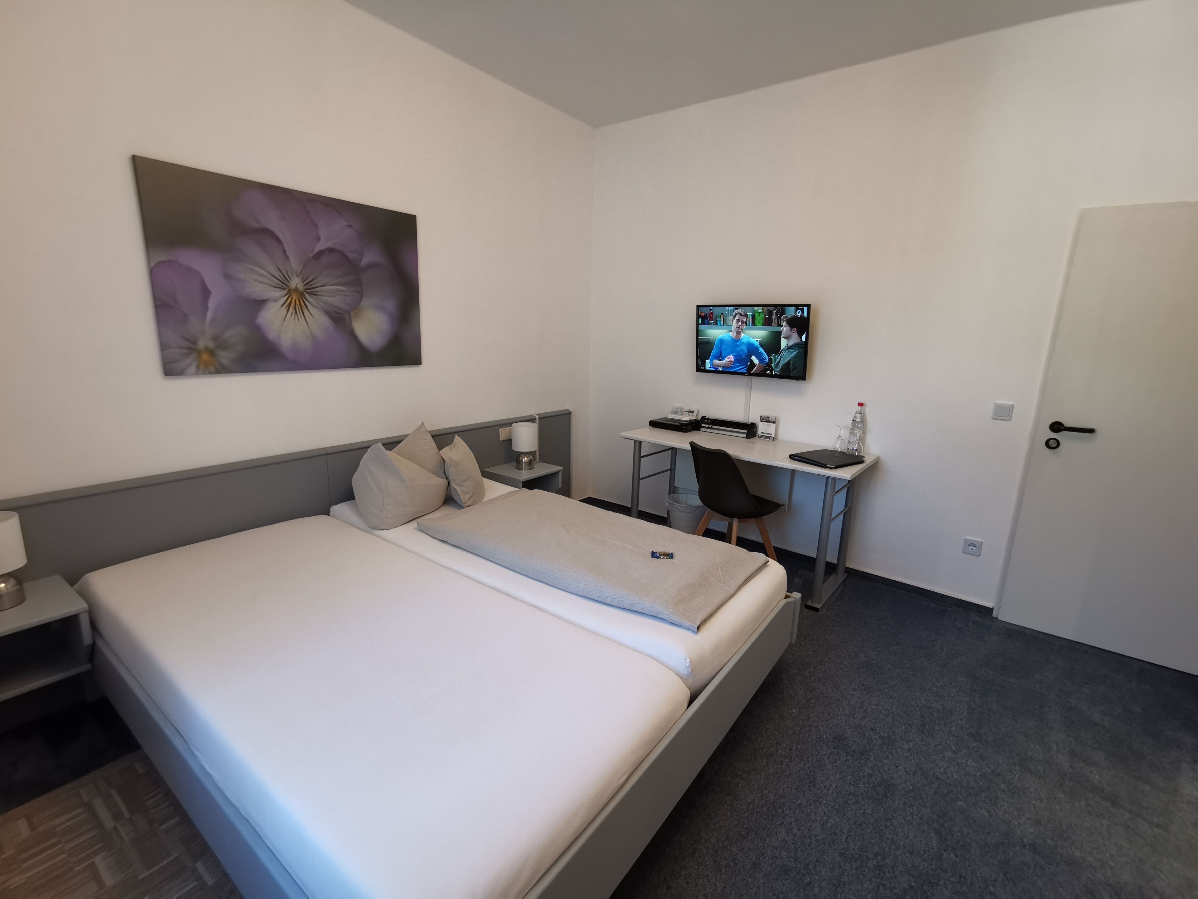 hypo-allergenic bedding, desk, blackout curtains, iron/ironing board