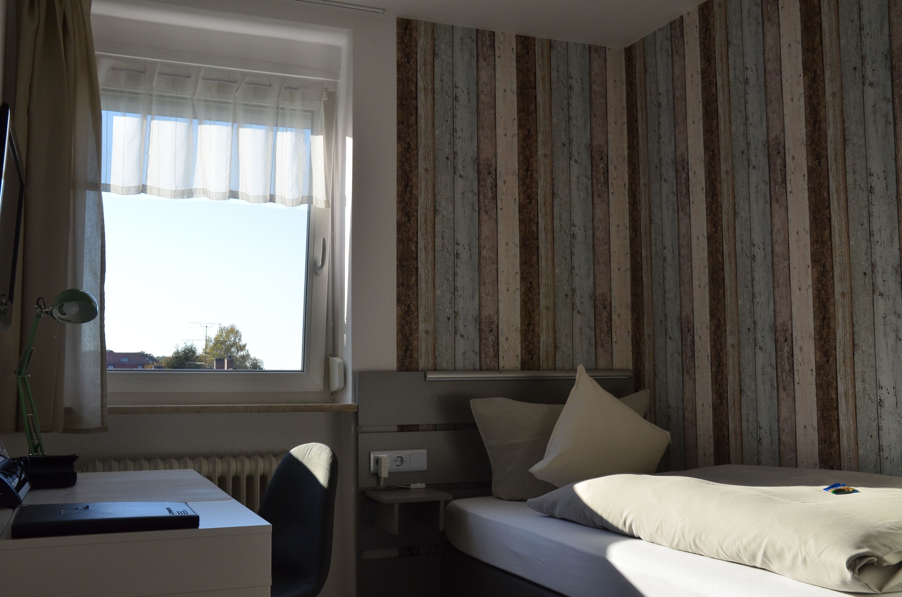 economy single room | hypo-allergenic bedding, desk, blackout curtains, iron/ironing board