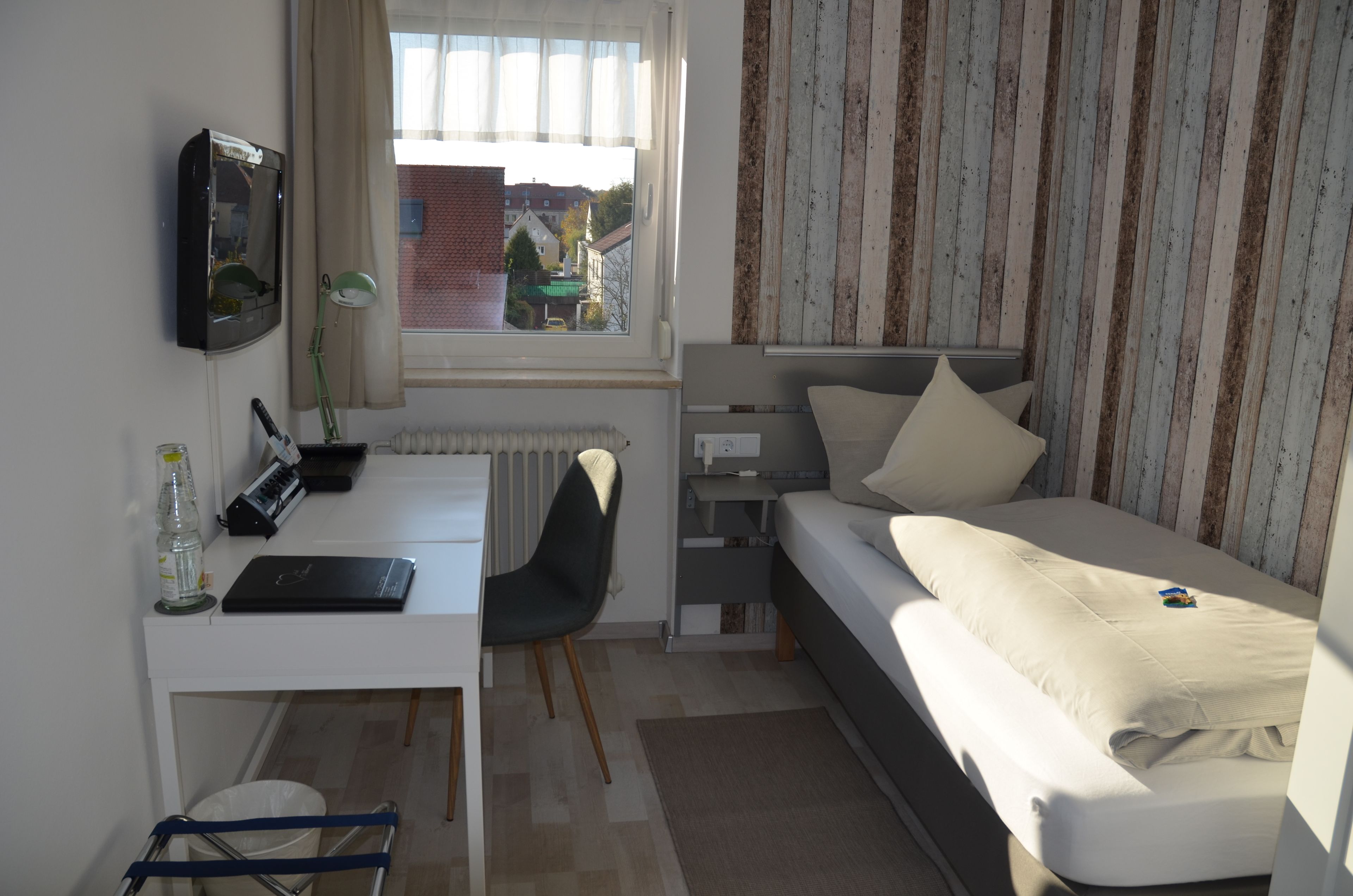 economy single room | hypo-allergenic bedding, desk, blackout curtains, iron/ironing board