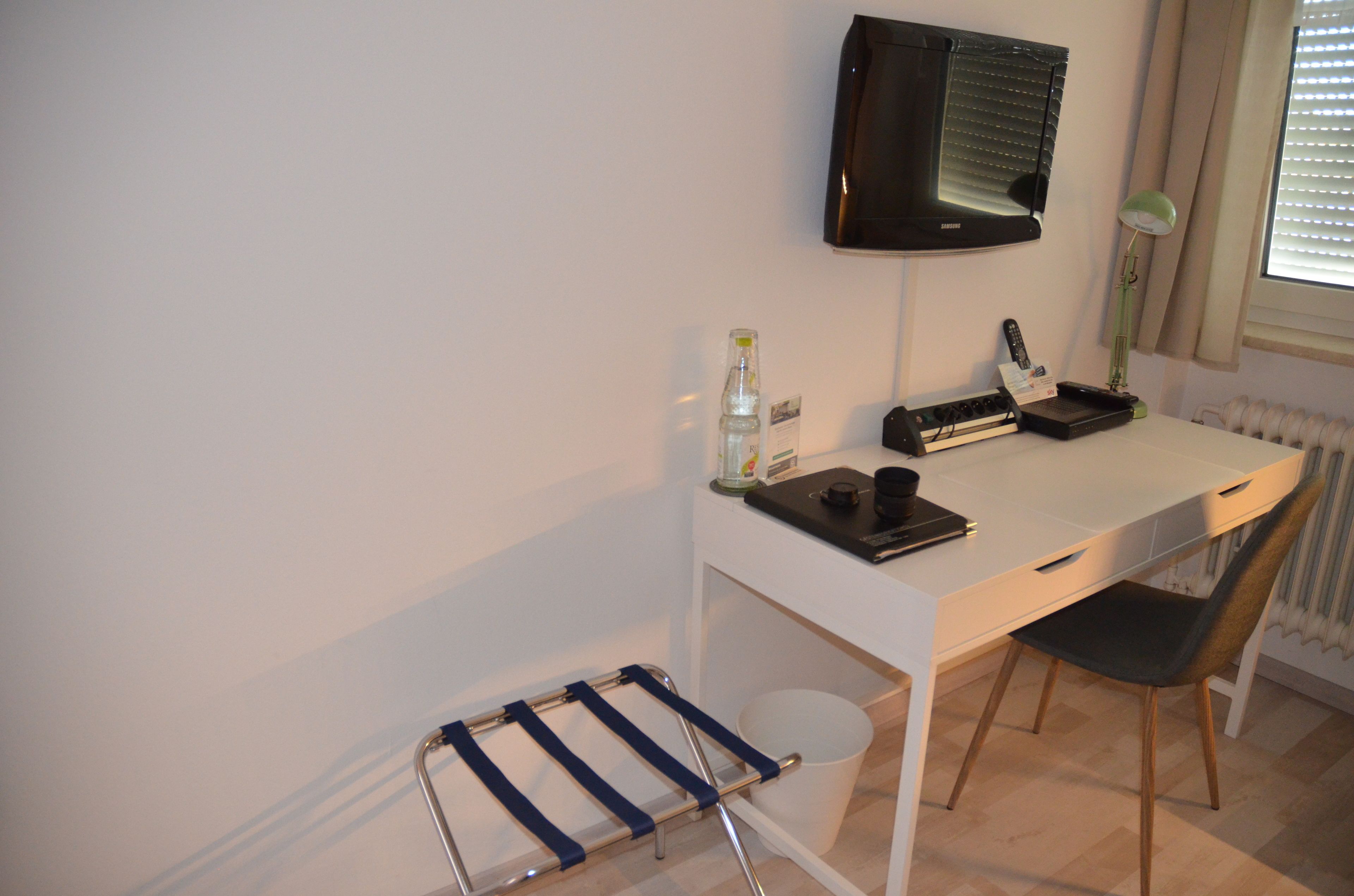 economy single room | hypo-allergenic bedding, desk, blackout curtains, iron/ironing board