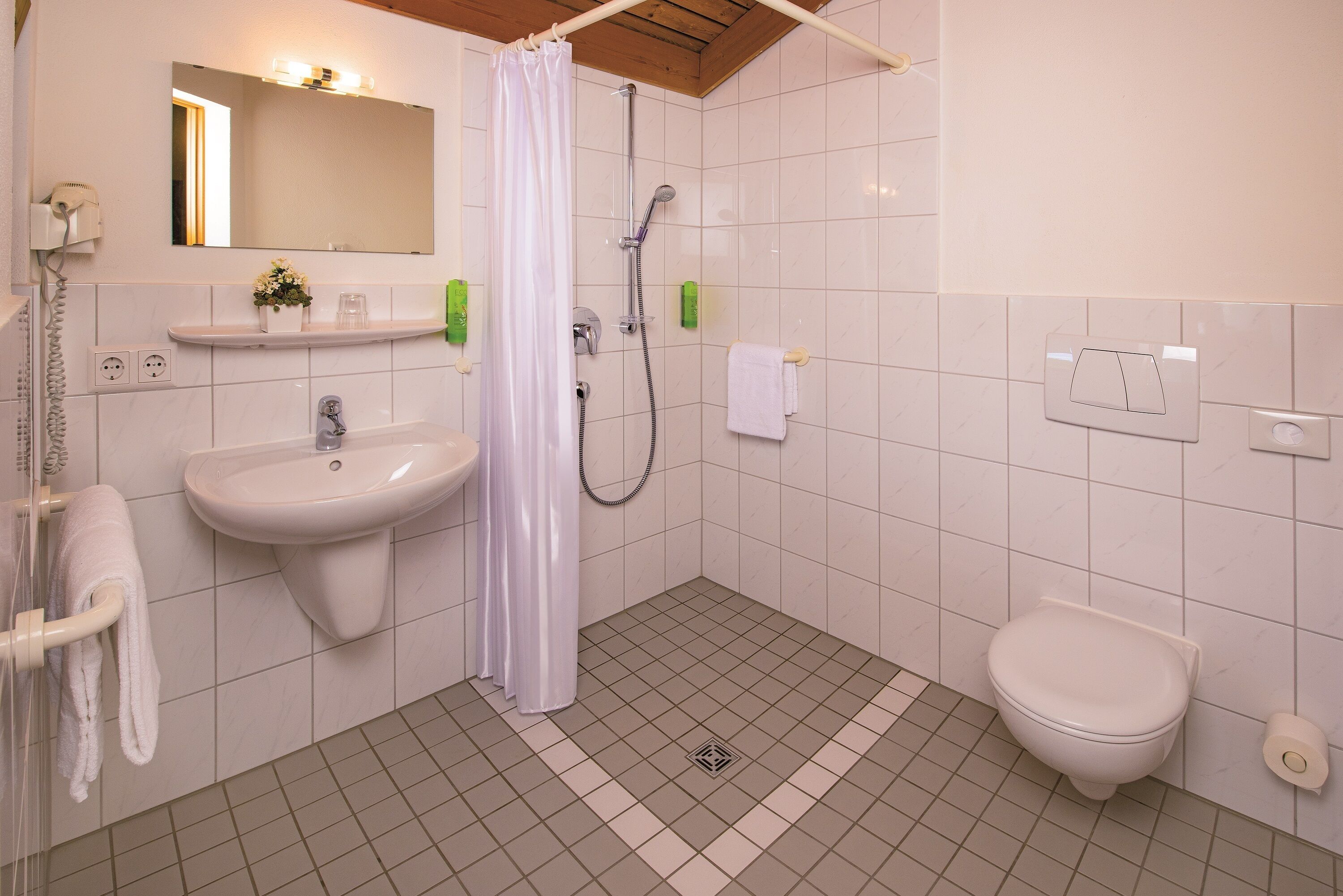 shower, eco-friendly toiletries, hair dryer, towels