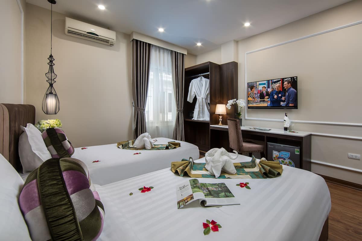 Phòng 2 giường đơn Deluxe | Minibar, két bảo mật tại phòng, bàn, màn/rèm cản sáng 