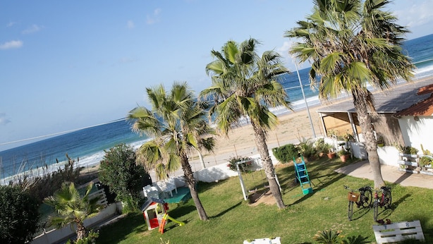 A beach view with palm trees, a swing set, and a small playhouse. - ~ Playa Houses ~ With Wonderful Sea View, Parking. (Balestrate)