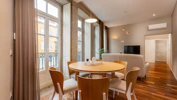 Two Bedroom Apartment 2A | Living area | Flat-screen TV