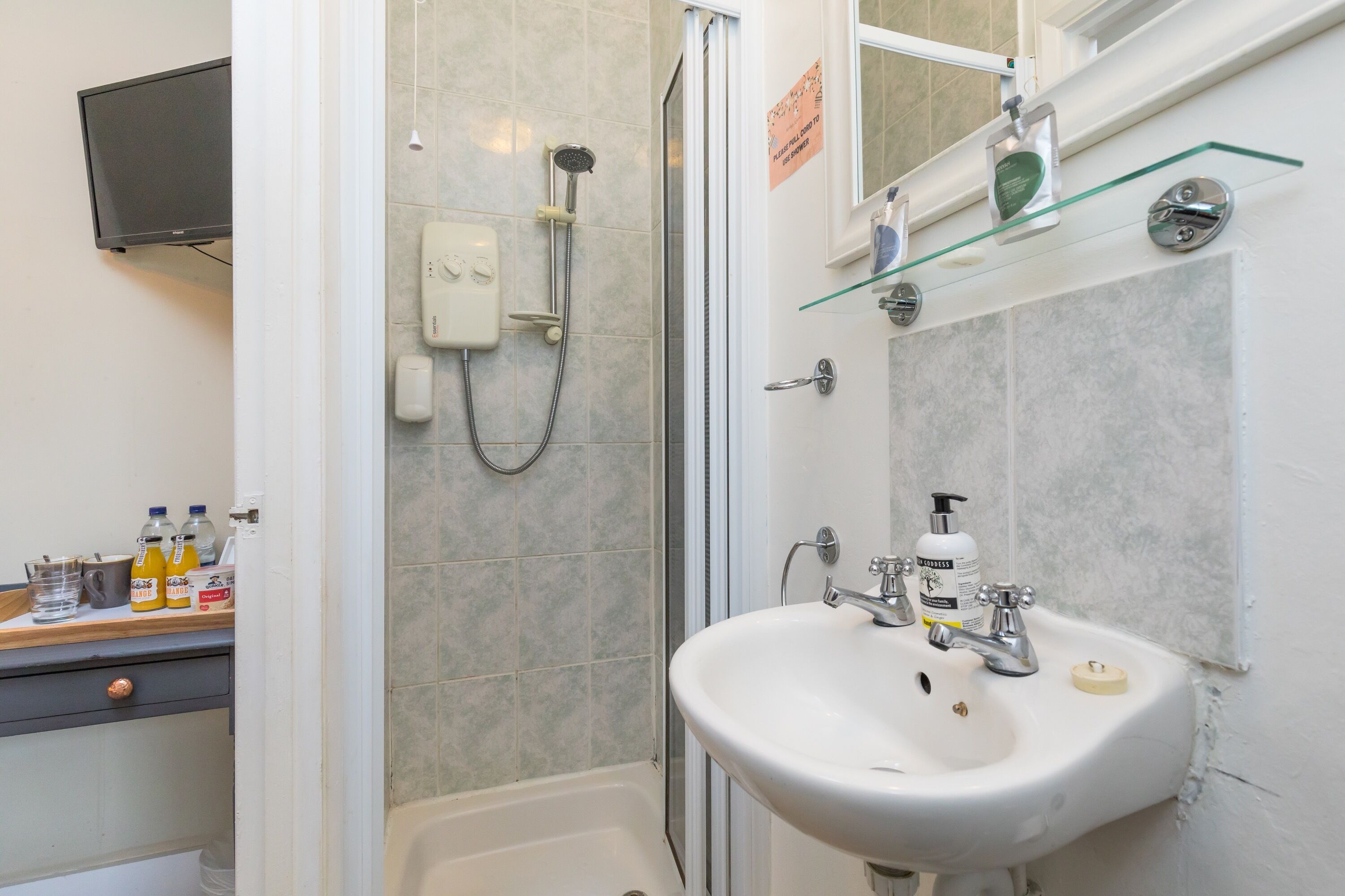double room with private shower | bathroom | free toiletries, hair dryer, towels, shampoo