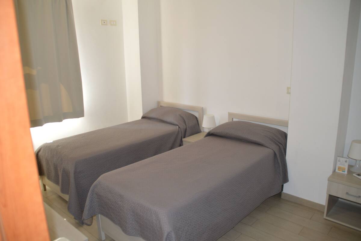 Premium bedding, desk, blackout curtains, free WiFi