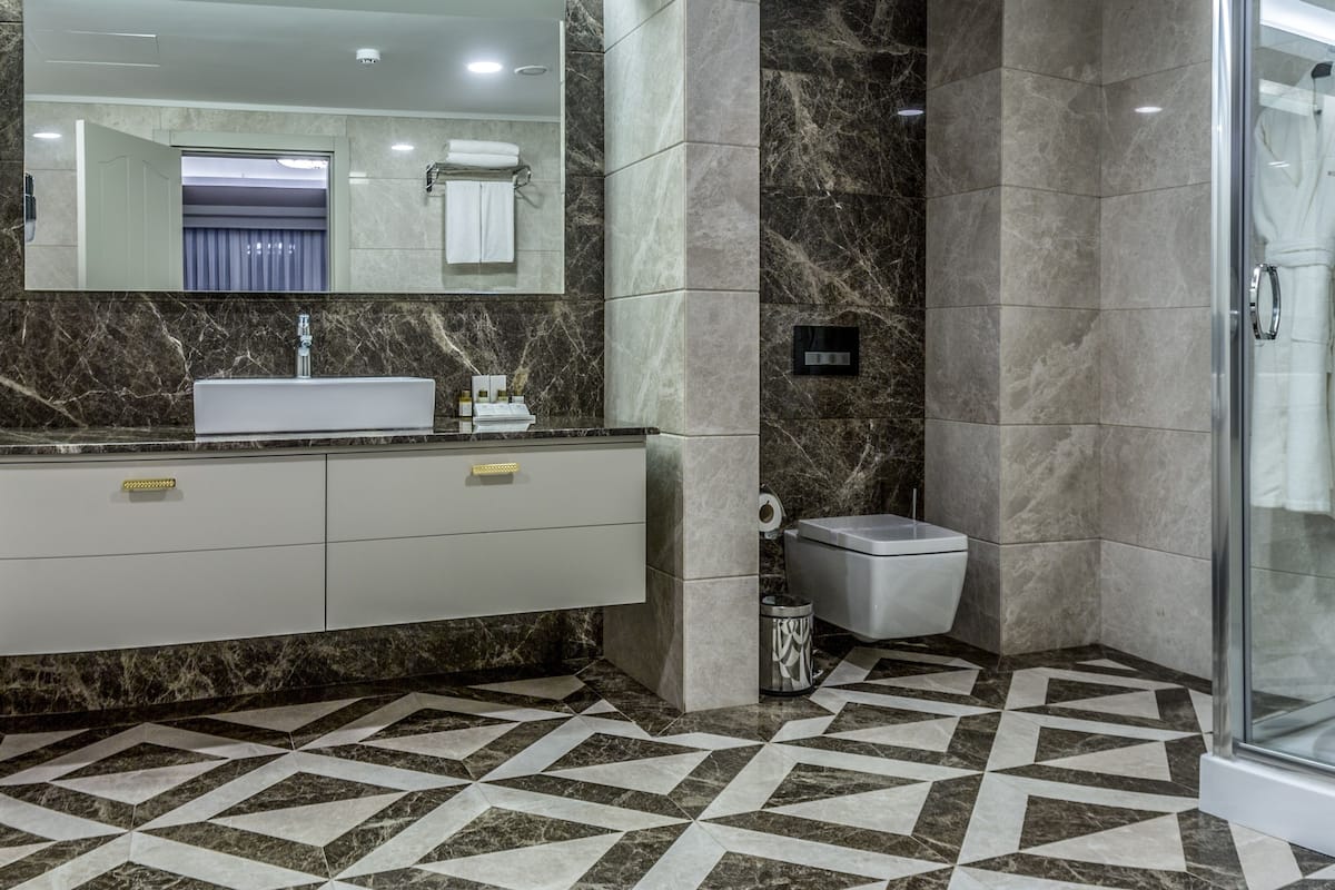 presidential suite | bathroom | shower, free toiletries, hair dryer, bathrobes