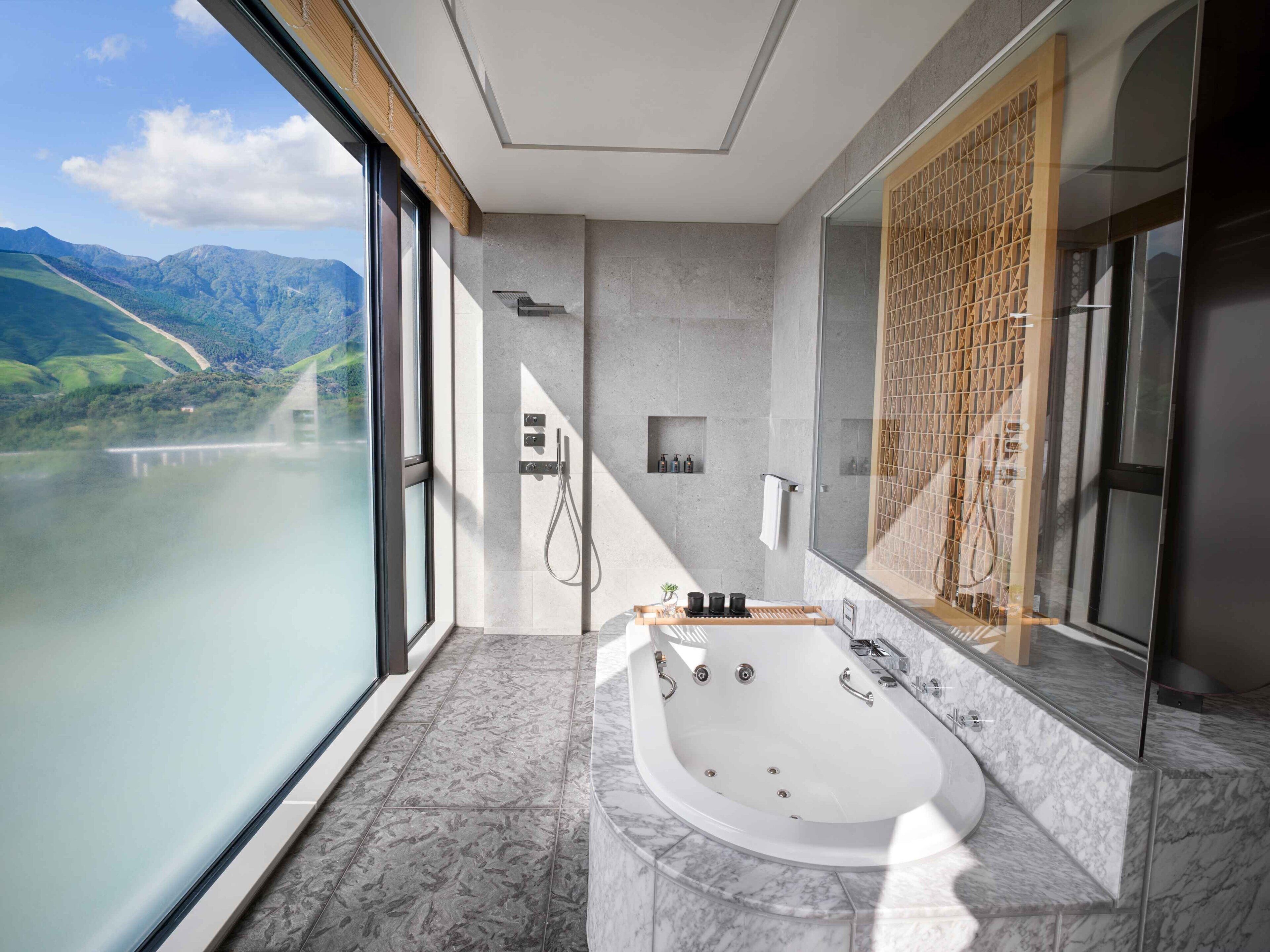 premium suite, 1 single bed (panorama) | bathroom | separate bathtub and shower, deep-soaking bathtub, rainfall showerhead