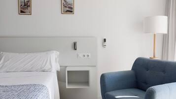 Exclusive Double Room, Non Smoking, Partial Sea View | 1 bedroom, in-room safe, desk, free WiFi