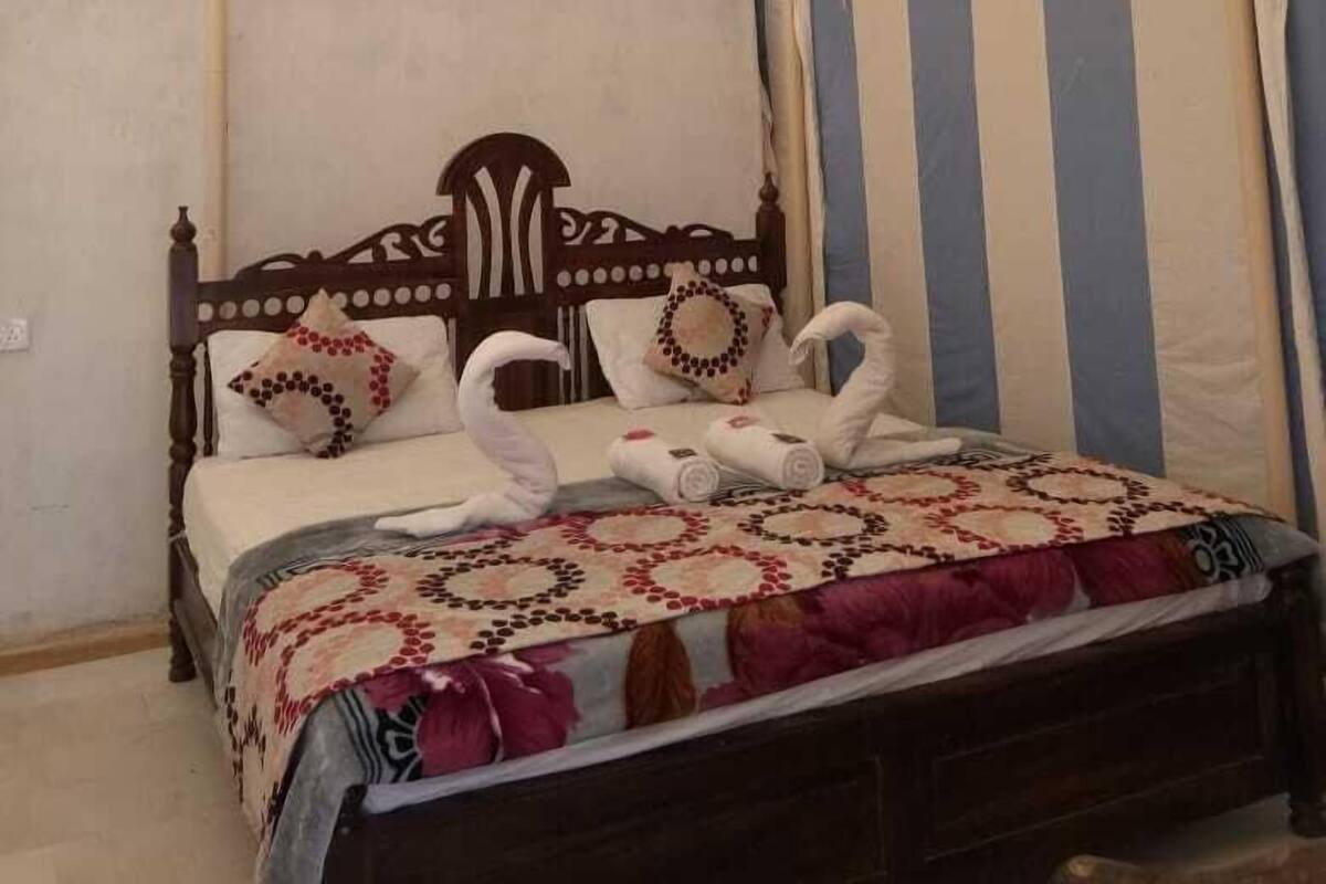 Deluxe Tent, 1 King Bed, Non Smoking | 1 bedroom, Egyptian cotton sheets, premium bedding, down comforters