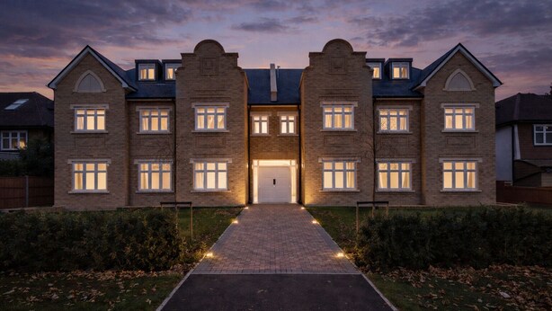 A large, two-story brick house with a symmetrical facade, multiple windows, and a central entrance. - Roomspace Apartments -Kinnaird Court (Esher)