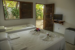 Quarto triplo | Frigobar, escrivaninha, Wi-Fi de cortesia, roupa de cama