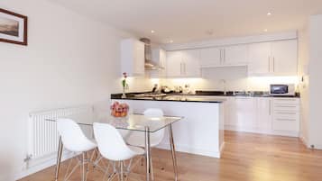 Apartment, 2 Bedrooms | Living area | Flat-screen TV