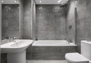 Combined shower/bathtub, deep-soaking bathtub, hair dryer, towels