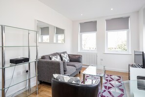 Apartment, 1 Bedroom | Living area | Flat-screen TV - Roomspace Apartments -Swan House (Leatherhead)