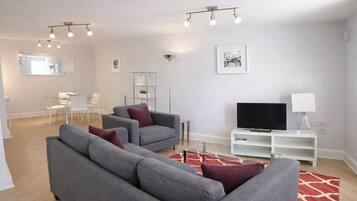 Apartment, 2 Bedrooms | Living area | Flat-screen TV, DVD player