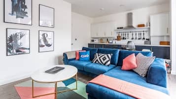 Apartamento, 2 quartos, para não fumantes | Área de estar | TV de tela plana