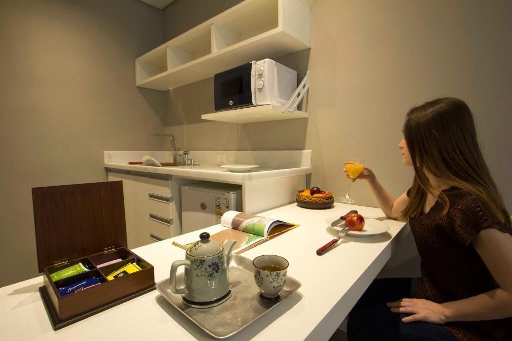 fridge, microwave, electric kettle, cookware/dishes/utensils