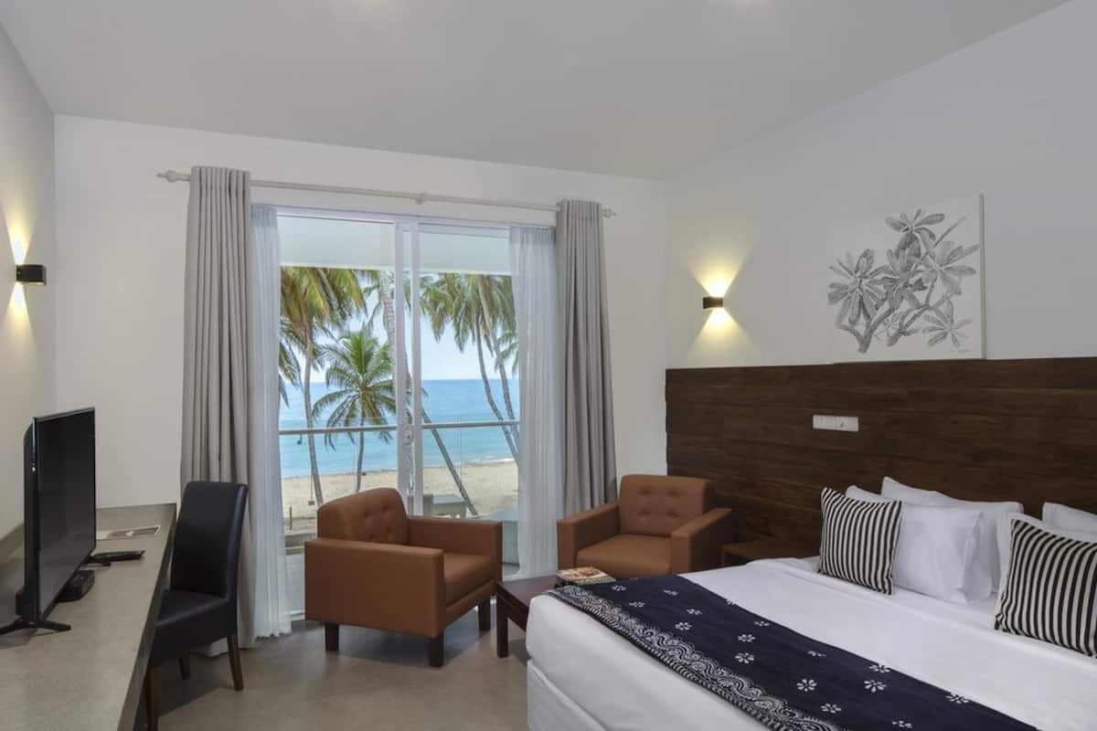 Deluxe-Doppelzimmer, Balkon, Meerblick | Wohnbereich