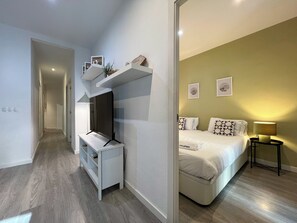 2 dormitorios, tabla de planchar con plancha, wifi y ropa de cama