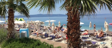 Beach nearby, sun loungers