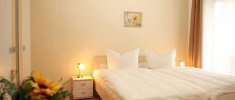 3 slaapkamers, een strijkplank/strijkijzer, reisbedje, gratis wifi