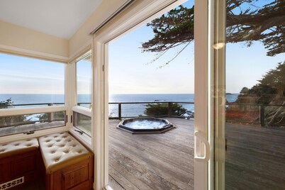 Oceanfront home with private hot tub, views, & close beach access