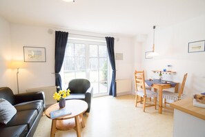 70-cm flat-screen TV with satellite channels, TV