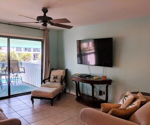 Condo, 2 Bedrooms | Living area - Deep Water Cove by Surfside VR (Pensacola Beach)