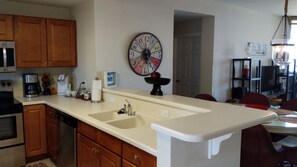 Condo | Private kitchen | Full-size fridge, microwave, oven, stovetop