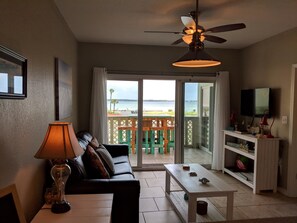 Condo, 2 Bedrooms | Living area | Flat-screen TV - Baywatch by Surfside VR (Pensacola Beach)