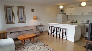 Apartamento, 1 cama King e sofá-cama, para não fumantes | Sala de estar