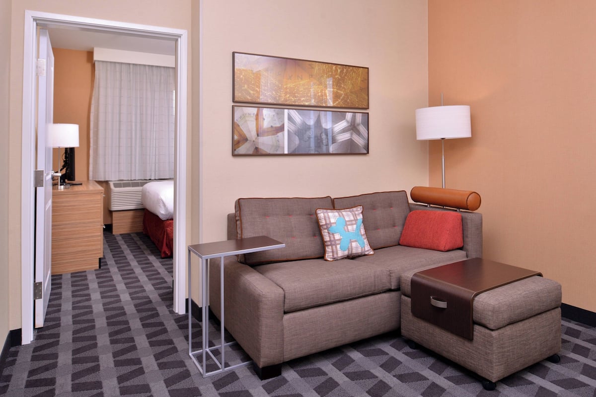 Suite, 1 Bedroom | Living area | 32-inch flat-screen TV with cable channels, TV