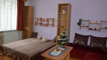 Blackout curtains, iron/ironing board, free WiFi, bed sheets