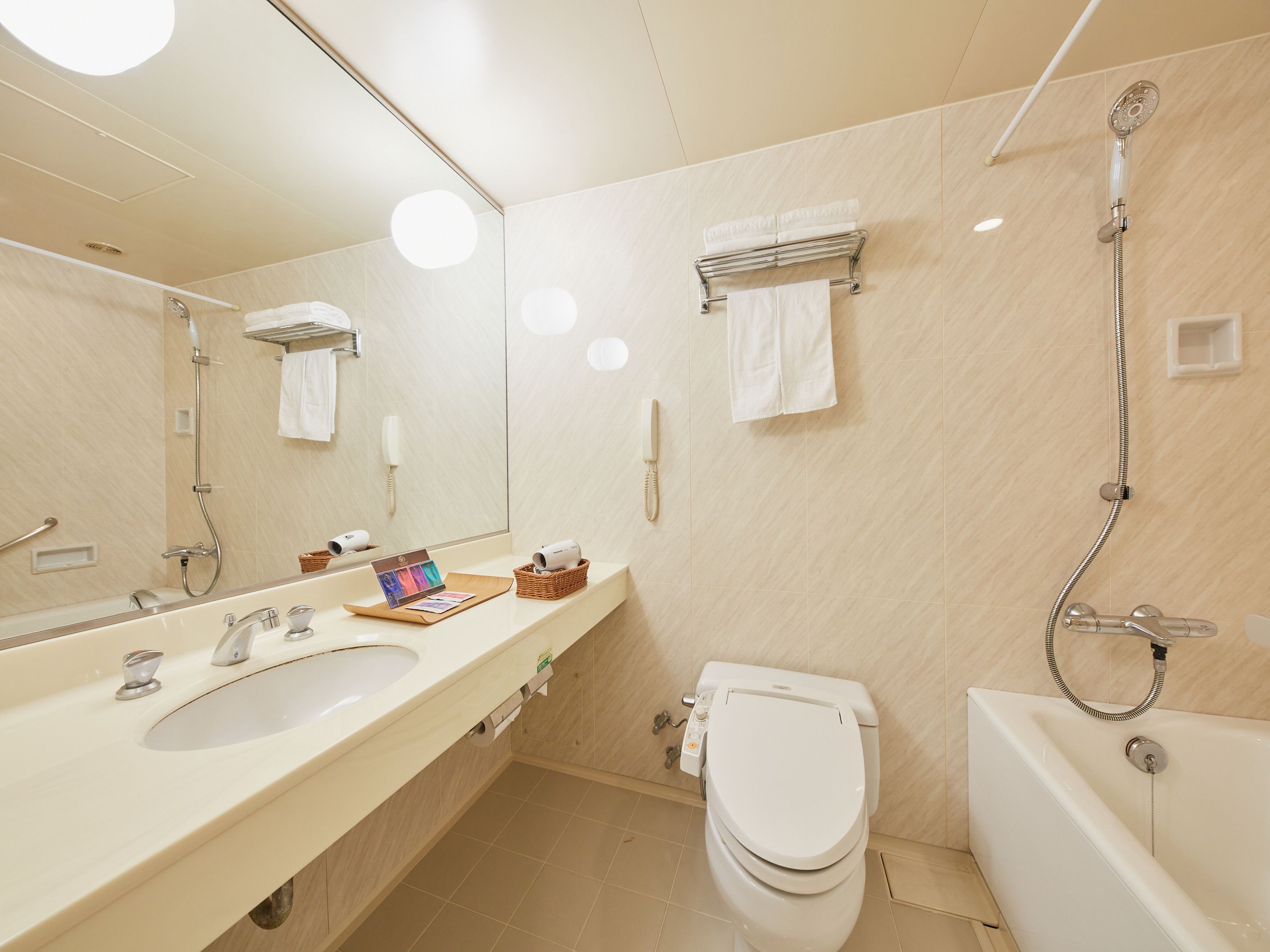 separate bathtub and shower, free toiletries, hair dryer, slippers