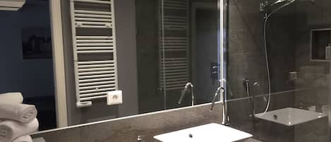 Shower, free toiletries, hair dryer, towels
