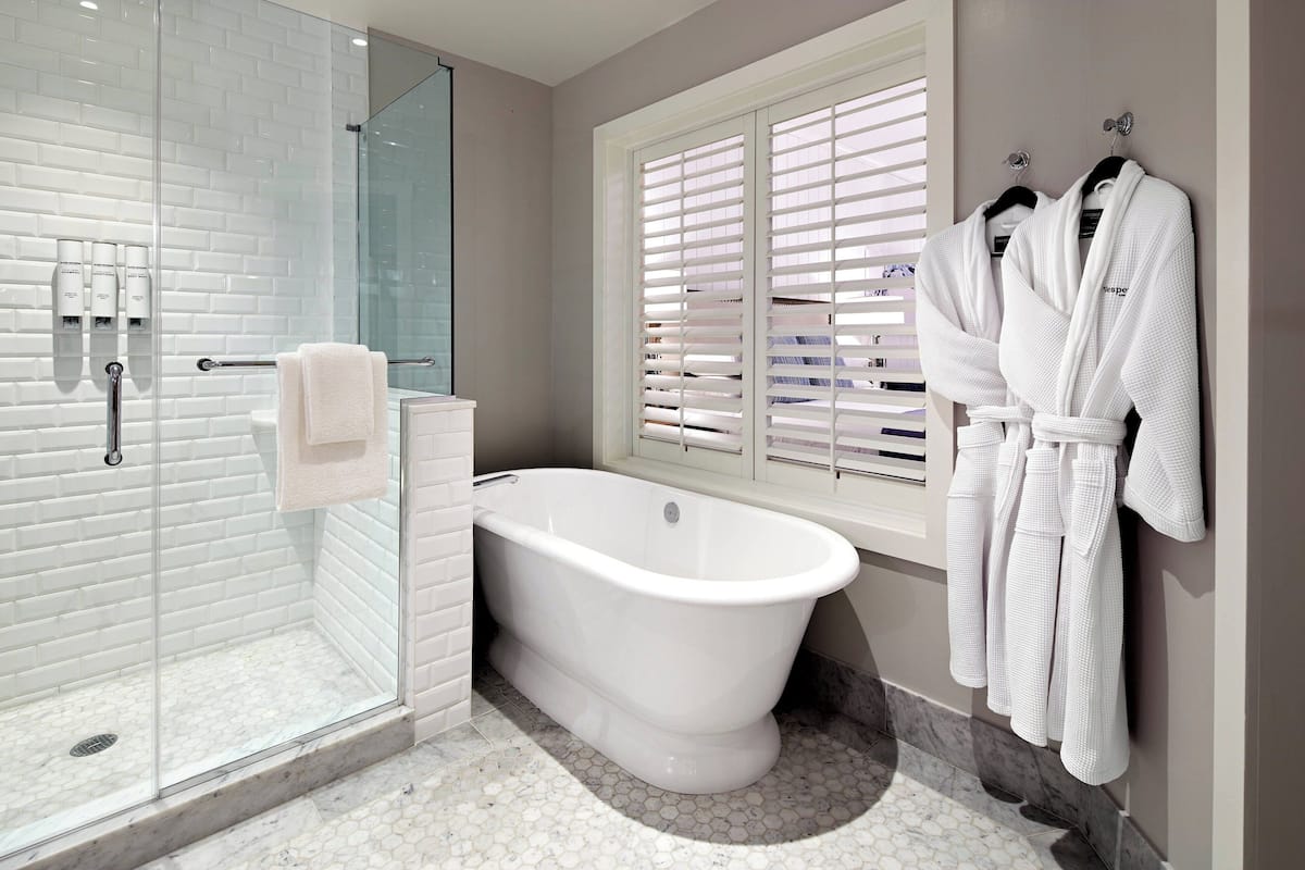 suite, 1 bedroom, ocean view | bathroom | shower, hydromassage showerhead, designer toiletries, hair dryer