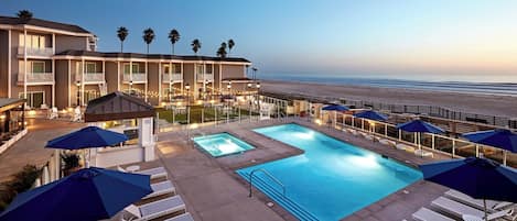 Outdoor pool, pool umbrellas, sun loungers