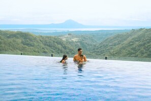 Outdoor pool, open 7:00 AM to 9:00 PM, pool umbrellas, sun loungers - Twin Lakes Hotel - near Tagaytay (Laurel)