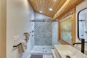 Bathtub, hair dryer, towels