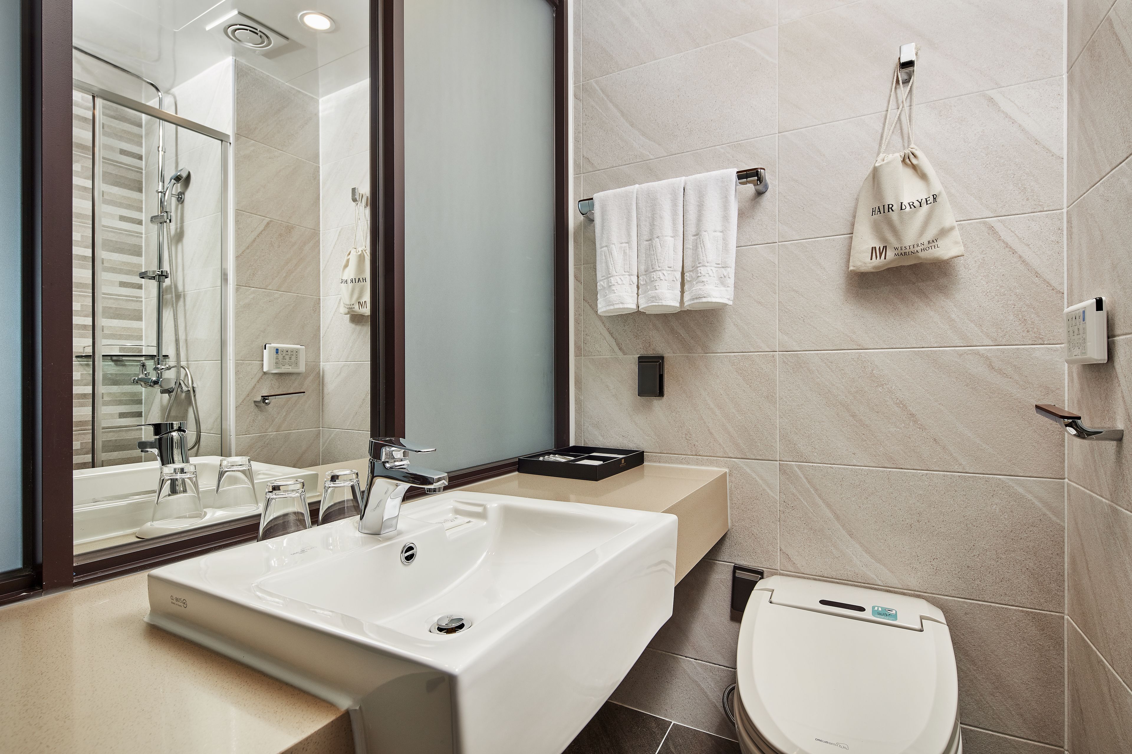 free toiletries, hair dryer, slippers, bidet