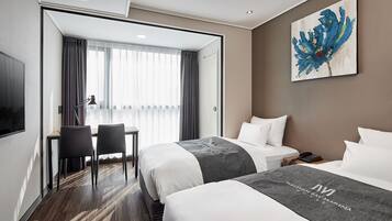 Standard Twin Room | Down comforters, blackout drapes, free WiFi, bed sheets