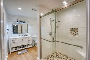 Bathtub, hair dryer, towels